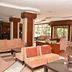 Anemon Ege Hotel in Izmir lobby lounge with seating area, dining tables, and large windows