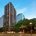 The York by Swiss-Belhotel in Sydney with a tall high-rise tower and city street view at dusk