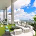 The Elser Hotel Miami rooftop terrace in Miami with city and bay views, lounge seating, and artificial turf