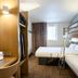 B&B HOTEL Paris Nord Villepinte room with bunk beds, desk, and window in Villepinte
