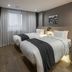 Hotel28 Myeongdong Seoul twin room with two beds, desk, and sheer-curtained window