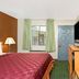 Travelodge by Wyndham Sacramento / Rancho Cordova guest room with bed, TV, window and desk