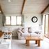 The Anchorage & The Tackleshed in Barry living area with kitchen, dining table and sofa