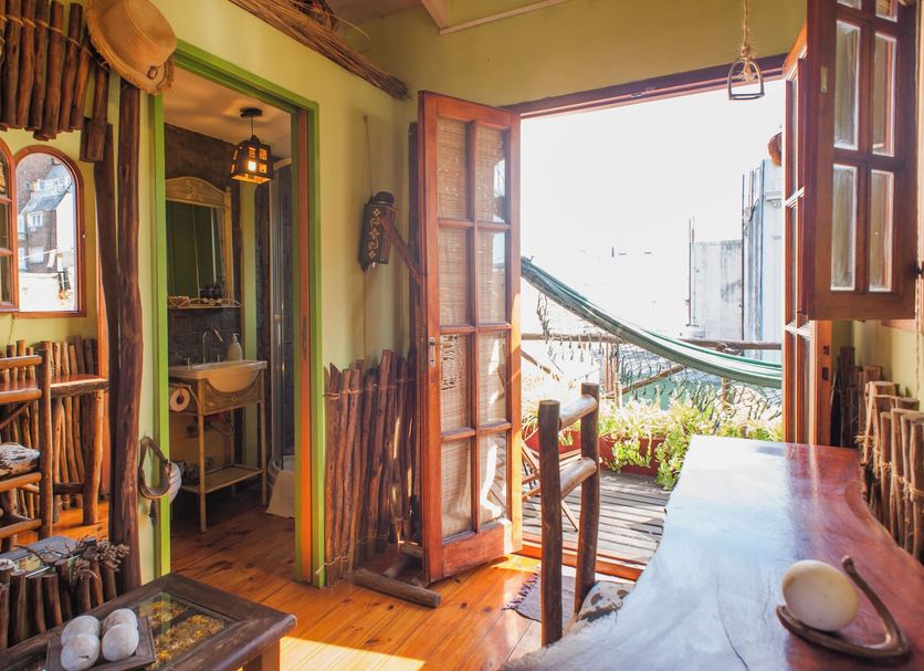 Apassionata Tango Hotel Buenos Aires room with open balcony, hammock chair, and city view