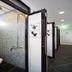 Vintage Inn Boutique Capsule @ Little India Singapore bathroom with shower stalls and sinks