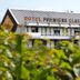 Premiere Classe Metz Nord - Semecourt exterior in Semécourt, partly framed by green foliage