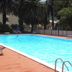 Tigullio Camping & Resort in Sestri Levante with outdoor pool and lounge chairs