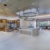 Tru by Hilton Lumberton lobby with reception desk, retail shelves and seating area