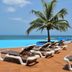 Pestana São Tomé poolside loungers beside an oceanfront infinity pool in São Tomé