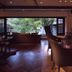 Sumiya Kiho-An Ryokan in Kameoka lounge with fireplace and large garden-view windows