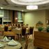 Buyuk Anadolu Eregli Hotel restaurant in Ereğli with set dining tables and warm interior lighting