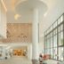 Bordoy Alcudia Bay in Alcúdia lobby with soaring ceilings, mosaic wall, and floor-to-ceiling windows