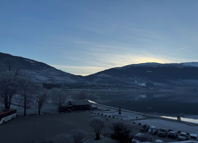 Park Hotel Vossevangen in Vossevangen with mountain and lake view at dusk