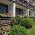 Komforthotel & Restaurant Riemann in Bad Lauterberg with balcony flower boxes and landscaped garden