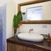 Otro Lado Lodge And Restaurant in Santa Teresa bathroom with stone shower and vessel sink