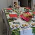 La Garona in Saint-Nicolas-de-la-Grave dining table set for breakfast with plates, breadbasket, and red napkins