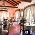 Hacienda La Magdalena Zapopan dining room with exposed beams and large windows