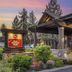 Best Western PLUS Truckee-Tahoe Hotel entrance in Truckee with stone portico and landscaped grounds