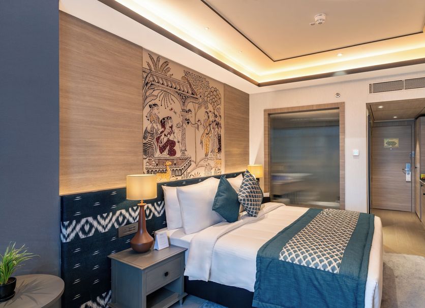 Fortune Park Sishmo, Bhubaneswar guest room with king bed, wall art, and soft lighting