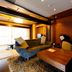Houraiya in Kamogawa: Japanese-style room with sofa, low table, and window seating