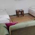 Cann Hotel, Konakli: simple guest room with two single beds, bedside table, and sofa