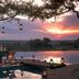 Four Seasons Safari Lodge Serengeti infinity pool at sunset overlooking the Serengeti savanna