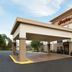 Hampton Inn Battle Creek exterior entrance with covered porte cochere in Battle Creek
