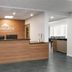 Wingate by Wyndham Sheboygan front desk with wood reception counter and branded wall