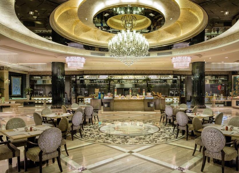 Chateau Star River Pudong Shanghai grand hotel dining room in Shanghai with chandelier and ornate ceiling