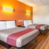 Motel 6 Elizabeth Nj Newark Liberty Intl Airport guest room with two beds and wood floors in Elizabeth