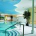 Indoor pool at Landhaus Zu den Rothen Forellen in Ilsenburg with curved ceiling and lounge chairs