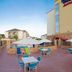 Fairfield Inn & Suites by Marriott Houston North/Spring outdoor patio with tables, umbrellas and seating
