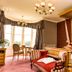 Loch Ness Country House Hotel, Inverness: elegant four-poster bedroom with bay window and seating area