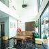 OYO 90151 Hill Inn Batu Caves lobby with black marble floor, seating area and elevator