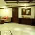 Brunton Heights Executive Suites Bengaluru lobby lounge with seating, mirror and polished tile floor