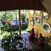 Huerta Real Mazamitla in Mazamitla with indoor seating, wall mirrors, and a garden view