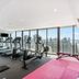 Rhapsody Resort Surfers Paradise gym with ocean and skyline views