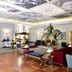Pousada de Lisboa in Lisbon lobby with equestrian statue, lounge seating, and mural ceiling