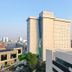 Lamora Kota Lama Surabaya hotel exterior with city skyline view in Surabaya