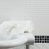 Hotel Mediterraneo in Porto Cesareo bathroom sink with chrome faucet and folded white towel