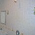 Phangan Great Bay Resort bathroom with tiled walls, sink, mirror, and shower fixture in Ko Pha Ngan
