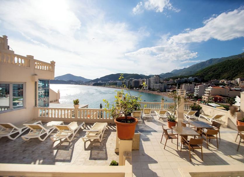 New Hotel Kuc by Marvel in Sveti Stefan with sun terrace, lounge chairs, and bay view