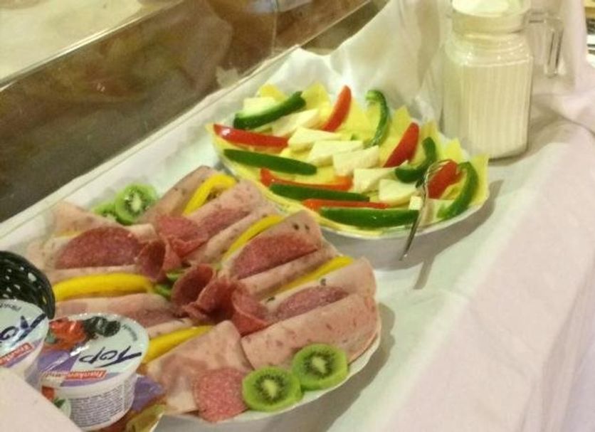 Etna Hotel & Ristorante, Veitshöchheim buffet table with sliced meats, fruit, and vegetable platters