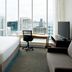 Residence Inn by Marriott Montreal Downtown guest room with bed, desk and city skyline views