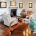 Casa Brenna Tosatto Art Experience in Lenno: elegant lounge with fireplace, sofas, armchairs and parquet floor