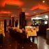 Hotel Ik London Residency Hyderabad restaurant with set dining tables and warm ambient lighting