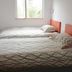 Pod Inn Shanghai Lujiazui guest room with two single beds and a window in Shanghai