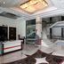 Hotel Shipra International lobby in New Delhi with marble floor, staircase and reception desk