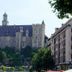 B&B HOTEL Montluçon with hillside castle and historic tower overlooking the street in Montluçon