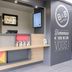 B&B HOTEL Calais Centre St Pierre reception desk with welcome wall in Calais